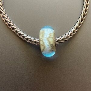 Trollbead light blue glass bead